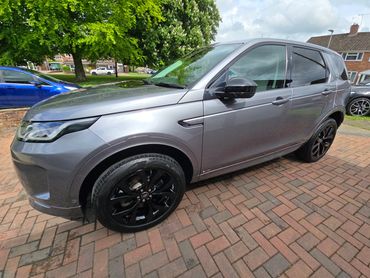 Front 3/4 of grey Range Rover Discovery polished to gloss by AM Auto Aesthetics
