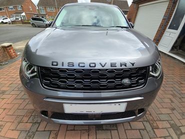 Front of grey Range Rover Discovery showing gloss after polish by AM Auto Aesthetics