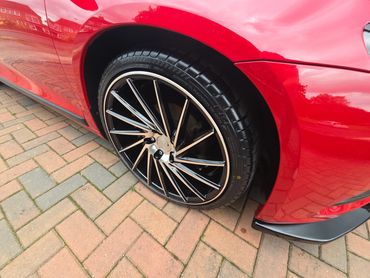 Wheel and caliper of red Volkswagen Scirocco cleaned by AM Auto Aesthetics
