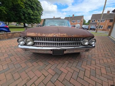 Front of Ford Fairlane 500 showing metsl gloss after polish by AM Auto Aesthetics