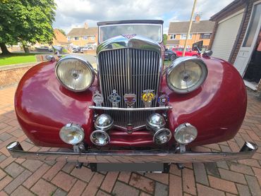 Front of red Alvis TA14 showing gloss after polish by AM Auto Aesthetics
