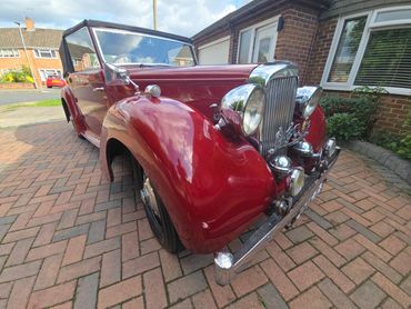 Front 3/4 of red Alvis TA14 with restored shine after valet by AM Auto Aesthetics