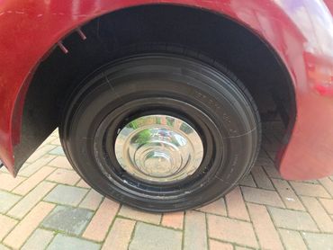 Wheel and caliper of red Alvis TA14 cleaned by AM Auto Aesthetics