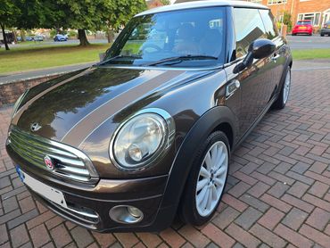 Front 3/4 of brown Mini Cooper polished to gloss by AM Auto Aesthetics