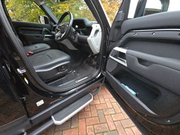 Range Rover Defender drivers side door open looking inside