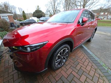 Front 3/4 of red Mazda CX-5 polished to gloss by AM Auto Aesthetics