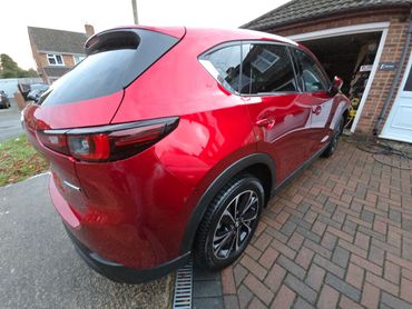 Rear 3/4 of red Mazda CX-5 polished and detailed by AM Auto Aesthetics