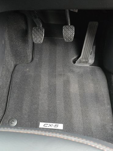 Interior Mazda CX-5 interior drivers side footwell after detailing