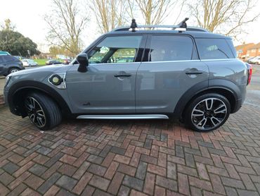 Passenger side of grey Mini Cooper showing polish and tyre shine