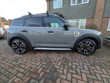 Driver side of grey Mini Cooper showing gloss and clean finish