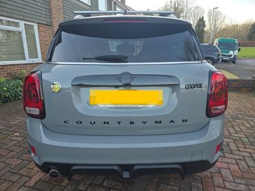 Rear of grey Mini Cooper with boot gloss and clean exhaust finish
