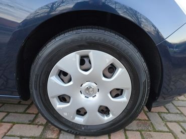 Wheel and caliper of blue Vauxhall Astra cleaned by AM Auto Aesthetics