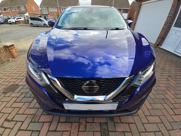 Front of purple Nissan Qashqai showing gloss after polish by AM Auto Aesthetics