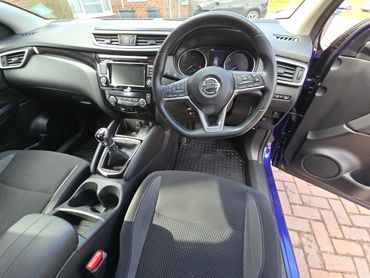 Interior of purple Nissan Qashqai from driver’s view after interior valet