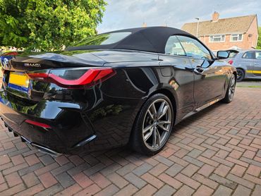 Rear 3/4 view of BMW 4 series after professional detailing by AM Auto Aesthetics in Salisbury.