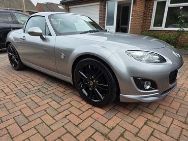 Front 3/4 of silver Mazda MX5 with restored shine after valet by AM Auto Aesthetics
