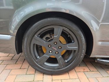 Rear wheel and caliper of grey VW Camper Van cleaned by AM Auto Aesthetics