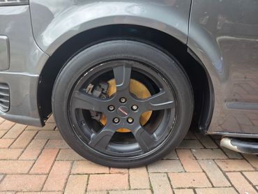 Front wheel and caliper of grey VW Camper Van cleaned by AM Auto Aesthetics