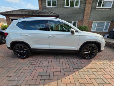 Driver side of white Seat Ateca showing gloss and clean finish