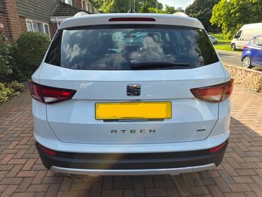 Rear of white Seat Ateca with boot gloss and clean exhaust finish