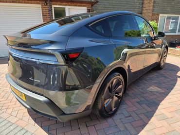 Rear 3/4 of Tesla Model Y detailed by AM Auto Aesthetics