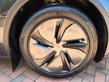 Wheel and caliper of Tesla Model Y cleaned by AM Auto Aesthetics