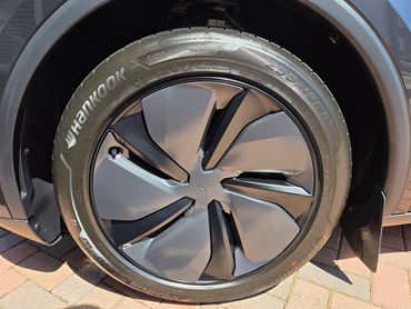 Wheel and caliper of Tesla Model Y cleaned by AM Auto Aesthetics