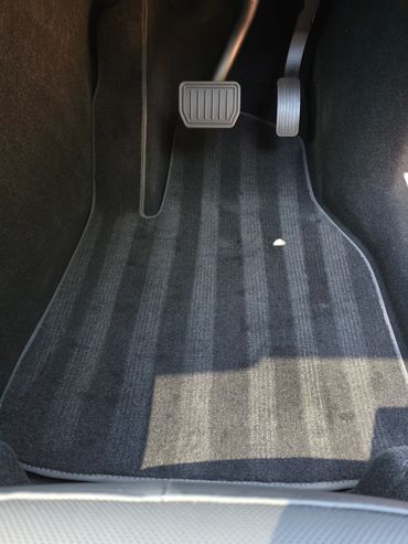 Front drivers footwell with clean pedal and carpet lines