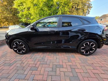 Passenger side of Ford Puma showing polish and tyre shine