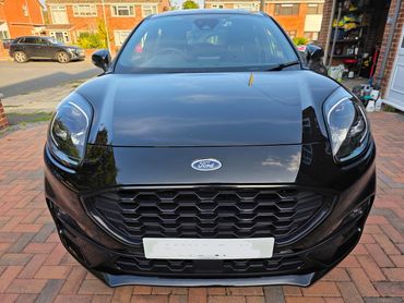 Front of Ford Puma showing gloss after polish by AM Auto Aesthetics