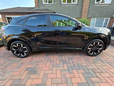 Driver side of Ford Puma showing gloss and clean finish