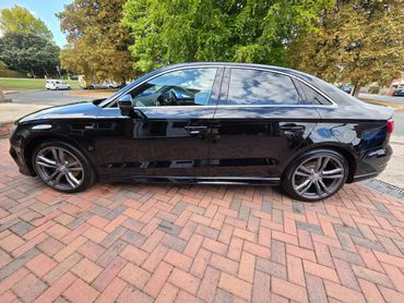 Passenger side of Audi A3 showing polish and tyre shine
