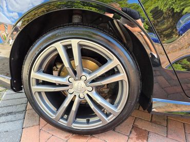 Wheel and caliper of Audi A3 cleaned by AM Auto Aesthetics