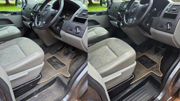 Side by side before and after image of drivers side interior VW Camper Van interior