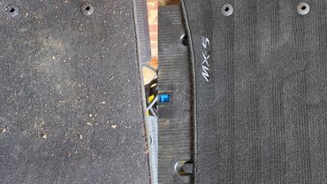Side by side before and after images showing the car mats by AM Auto Aesthetics