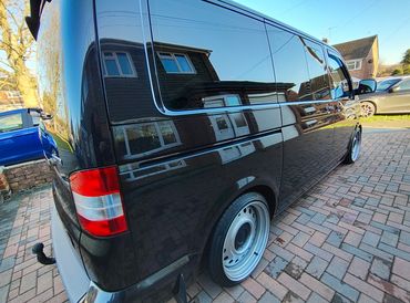 Rear 3/4 of black VW Transporter polished and detailed by AM Auto Aesthetics