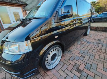Front 3/4 of black VW Transporter polished to gloss by AM Auto Aesthetics