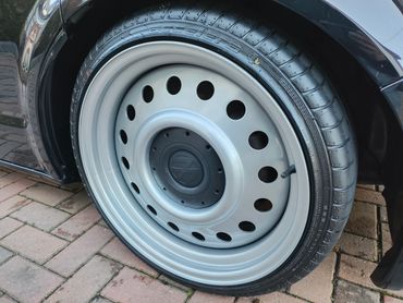 Wheel and caliper of black VW Transporter cleaned by AM Auto Aesthetics