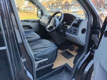 Interior VW Transporter drivers side door open after interior detail