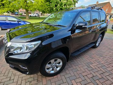 Front 3/4 of black Toyota Land Cruiser polished to gloss by AM Auto Aesthetics