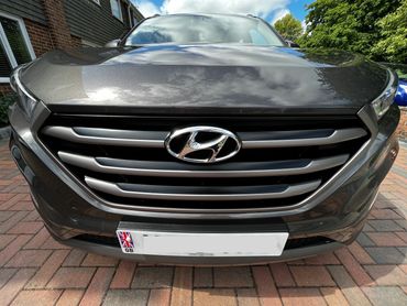 Front of grey Hyundai Tuscon showing gloss after polish by AM Auto Aesthetics
