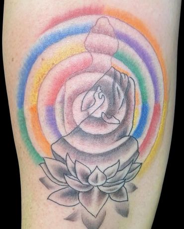 Radiant Buddha tattoo rainbow aura & black & grey lotus made at Stoic Body Art in Columbus, Ohio.