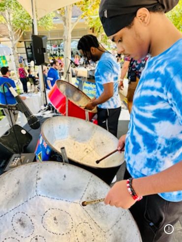 Tropical Steelpan Orchestra youth performing at a festival in Houston!