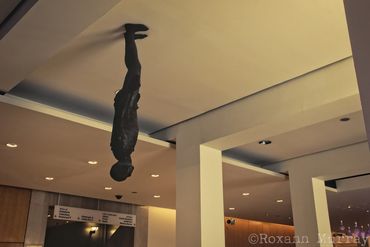 Upside statue on the ceiling at the Wellcome Collection