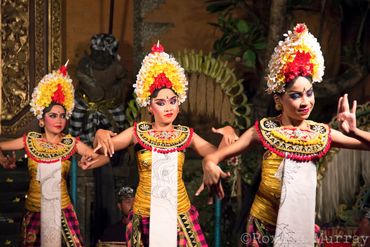 Three Balinese dancers perform Legong
