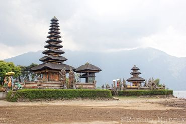Pura Ulun Danu Bratan is usually surrounded by water, but drought has caused the ground to be dry.