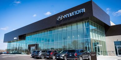 Auto Dealership with sheet metal fascia