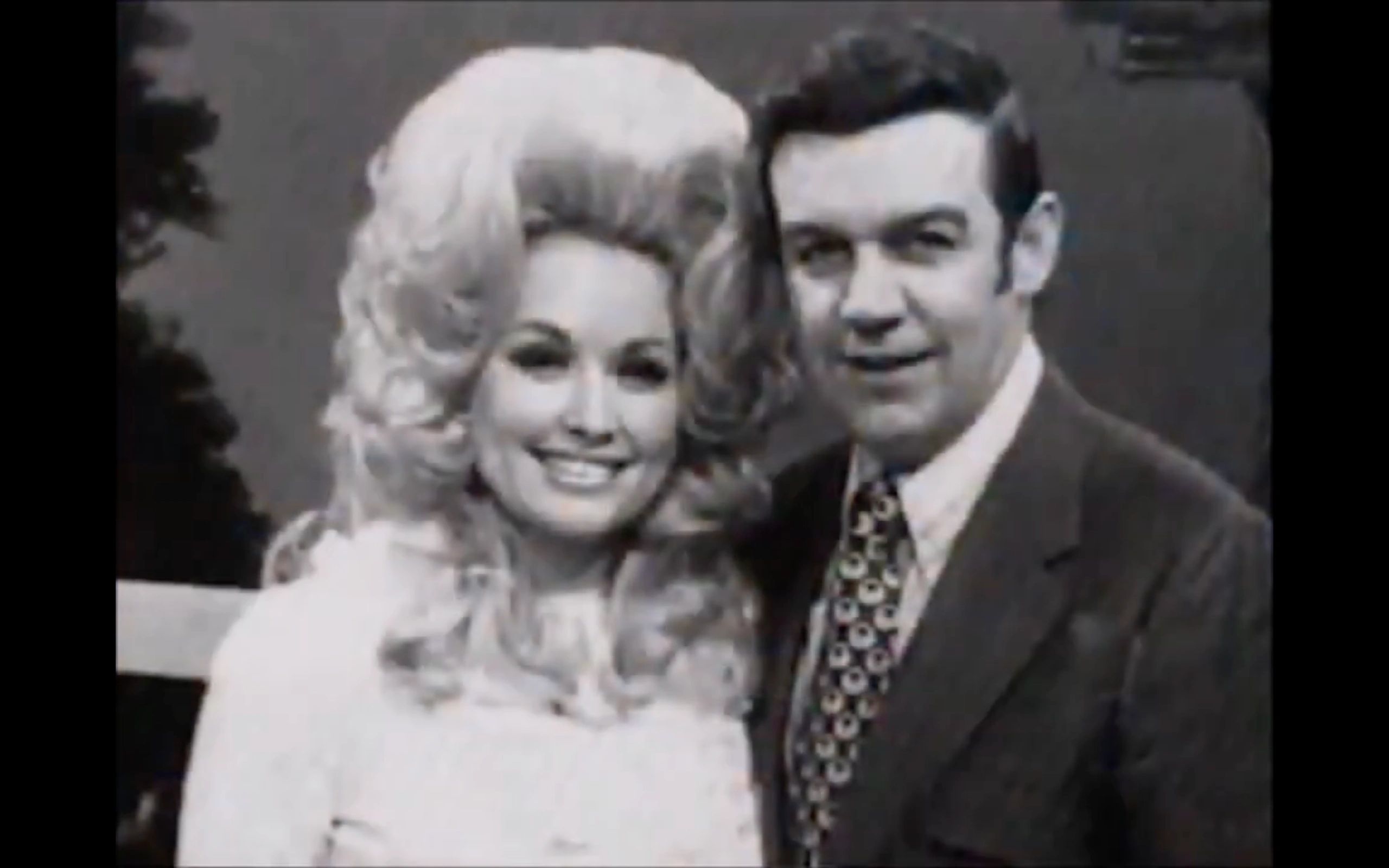E.W. "Bud" Wendall president and chief executive officer of the Opry and Opryland, with Dolly