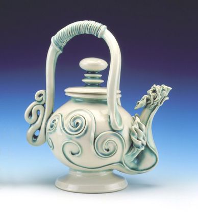 Artisan handcrafted porcelain dragon teapot