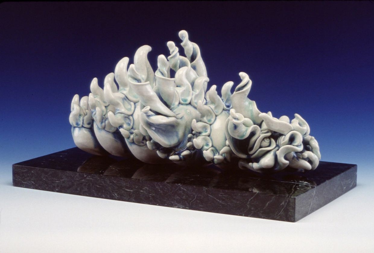 A rendition of Tatsu  clay artists porcelain dragon sculpture